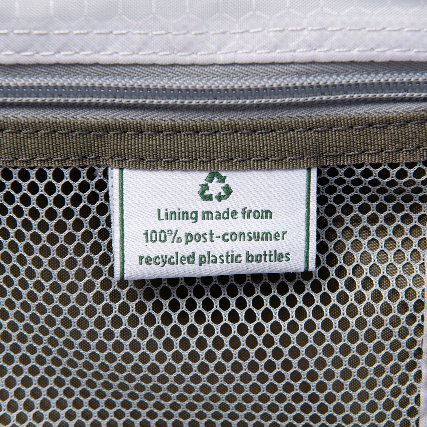 Textile product with a label indicating recycled plastic bottle material