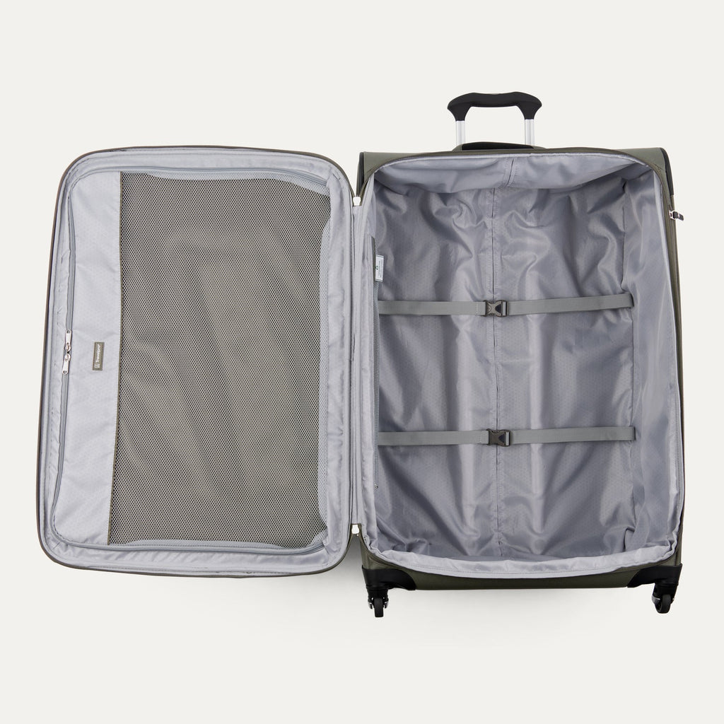 Open suitcase with interior compartments on a white background
