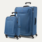 Two blue suitcases of different sizes on a white background