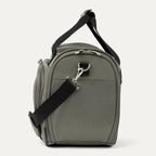 Side view of Green tote with black straps on a white background
