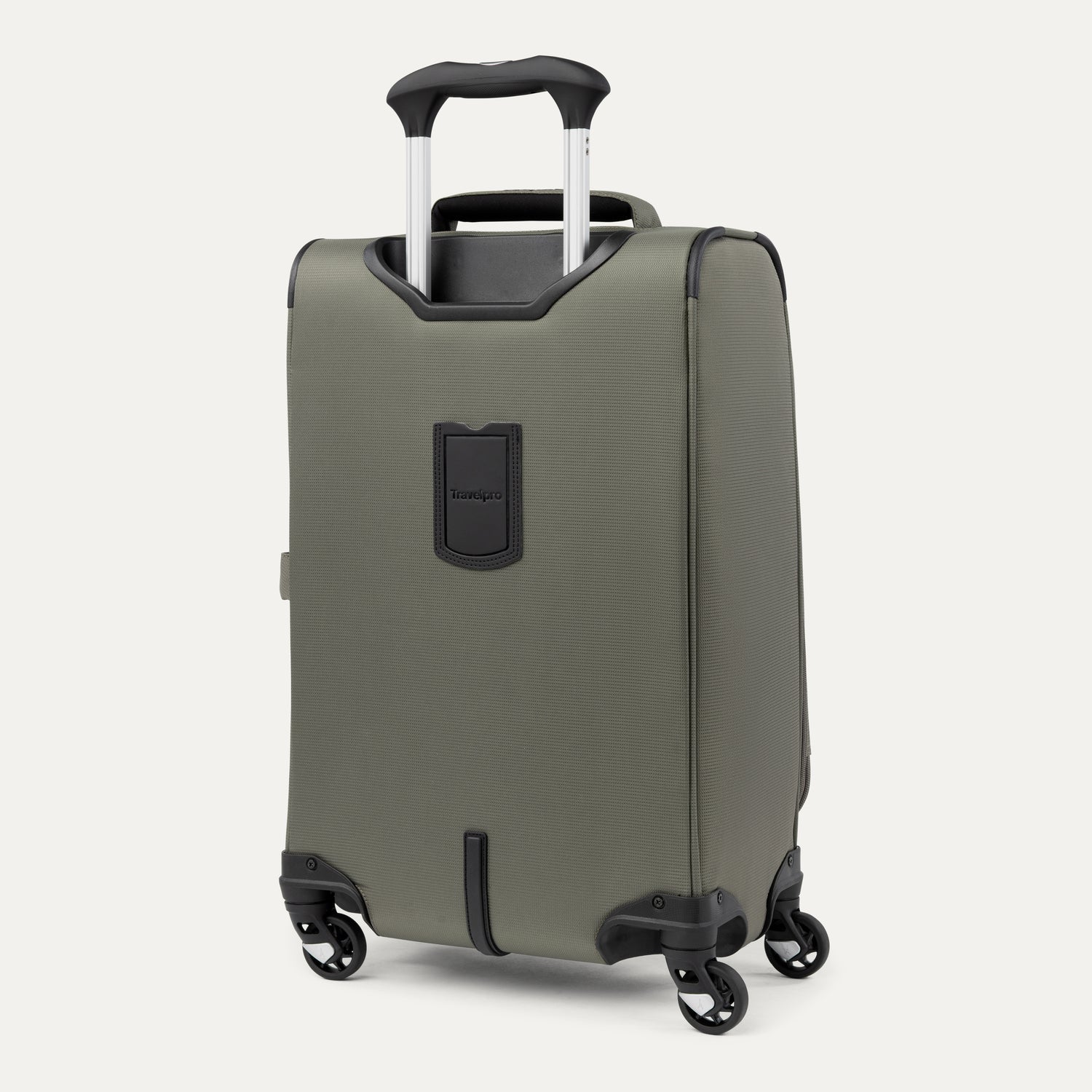 Green suitcase with black handle and wheels on a white background
