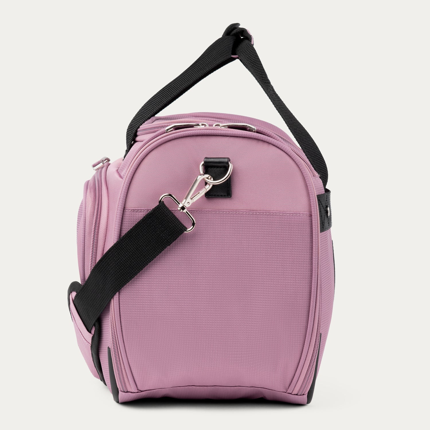 Side view of pink tote with black straps on a white background