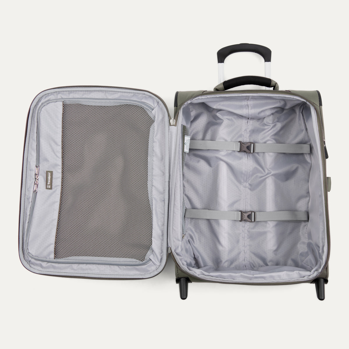 interior view of the open slate green travelpro maxlite 5 international carry-on rollaboard showing the light gray ecofab lining, a large mesh zippered lid pocket, and adjustable hold-down straps.