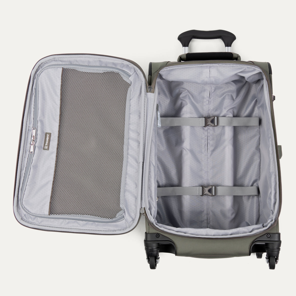 interior view of open slate green travelpro maxlite 5 compact carry-on spinner showing gray lining with adjustable compression straps and a large mesh lid pocket.