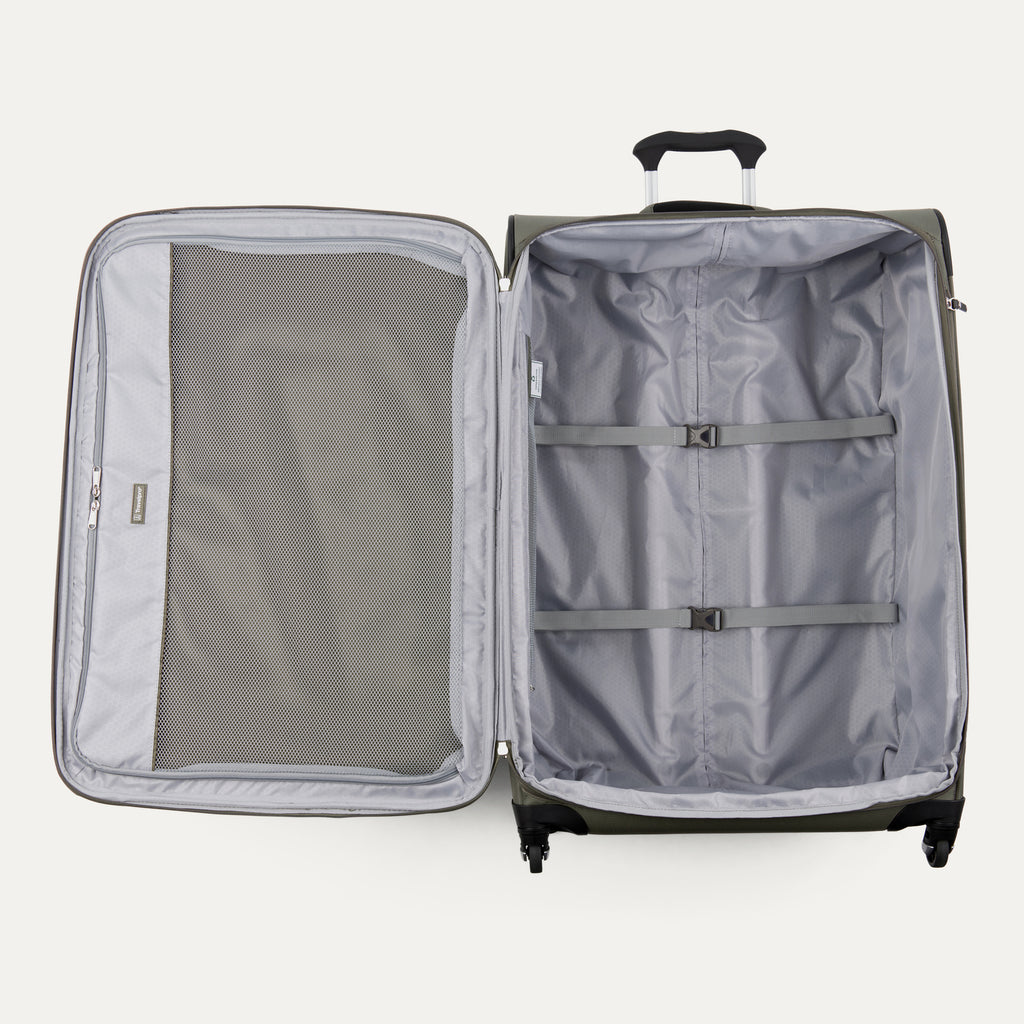 interior view of the open slate green travelpro maxlite 5 large check-in spinner showing the gray ecofab lining, adjustable hold-down straps, and a large mesh lid pocket for organization.