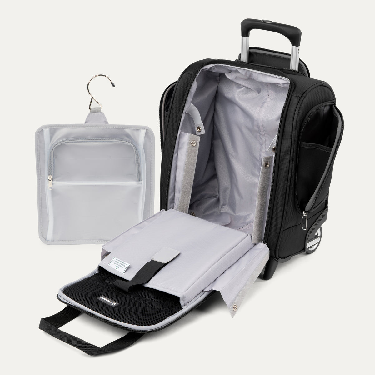 interior view of the open black travelpro maxlite 5 rolling underseat carry-on showing the light gray lining, padded laptop sleeve on the lid, and a removable hanging toiletry organizer.