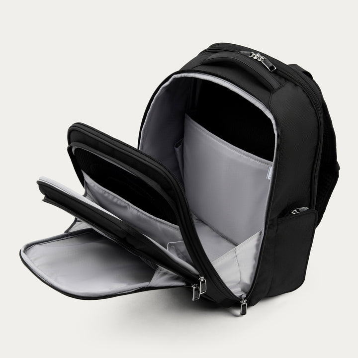 An aerial view of waves crashing against a shore.