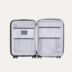 Interior view of Travelpro Maxlite® Air V2 Carry-On, featuring mesh dividers and zippered compartments for organized packing.
