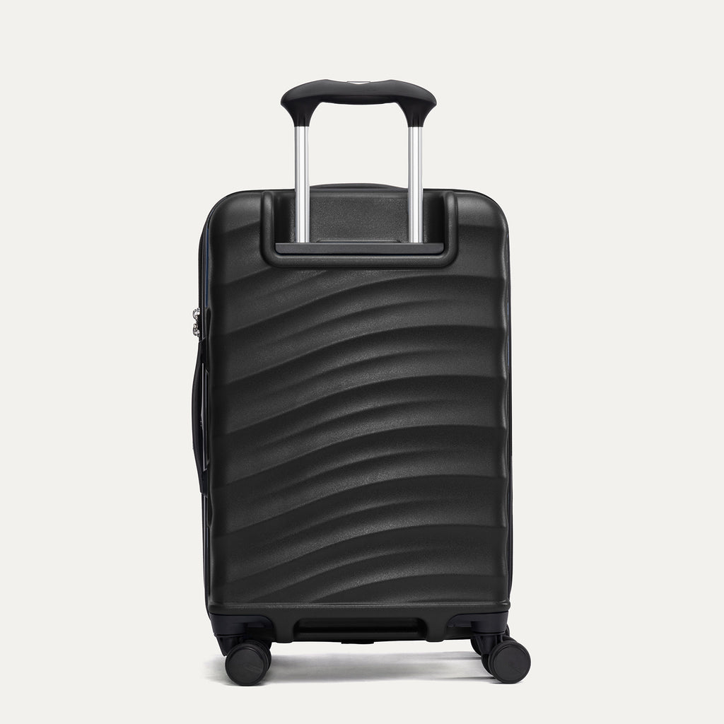 Rear view of Travelpro Maxlite Air V2 Spinner in Black, showing the extended telescopic handle and side carry handle