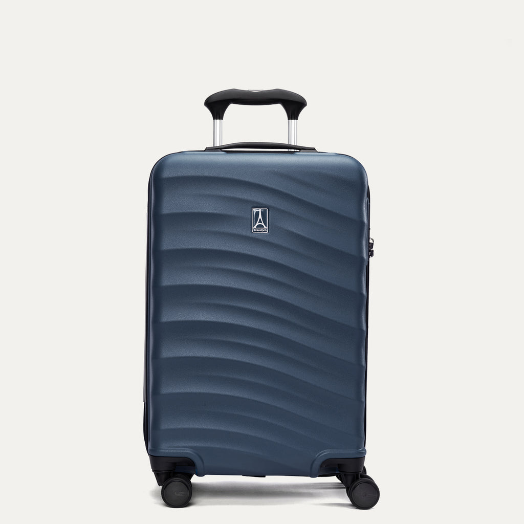 Front view of Travelpro Maxlite Air V2 Carry-On Spinner in Midnight Blue, featuring extended handle and textured hard shell.