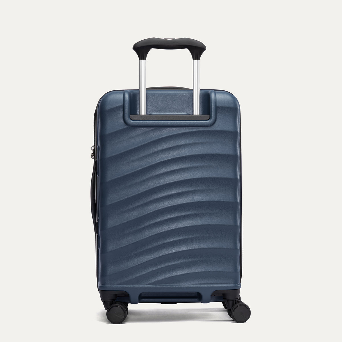 Rear view of Travelpro Maxlite Air V2 Spinner in Midnight Blue, showing the extended telescopic handle and side carry handle