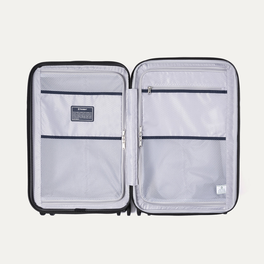 Interior view of Travelpro Maxlite Air V2 Spinner, featuring mesh zippered compartments for organized packing.
