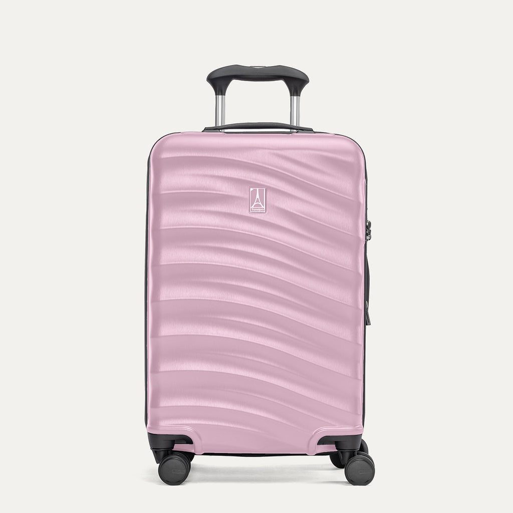 Front view of Travelpro Maxlite Air V2 Carry-On Spinner in Orchid Pink, featuring extended handle and textured hard shell.