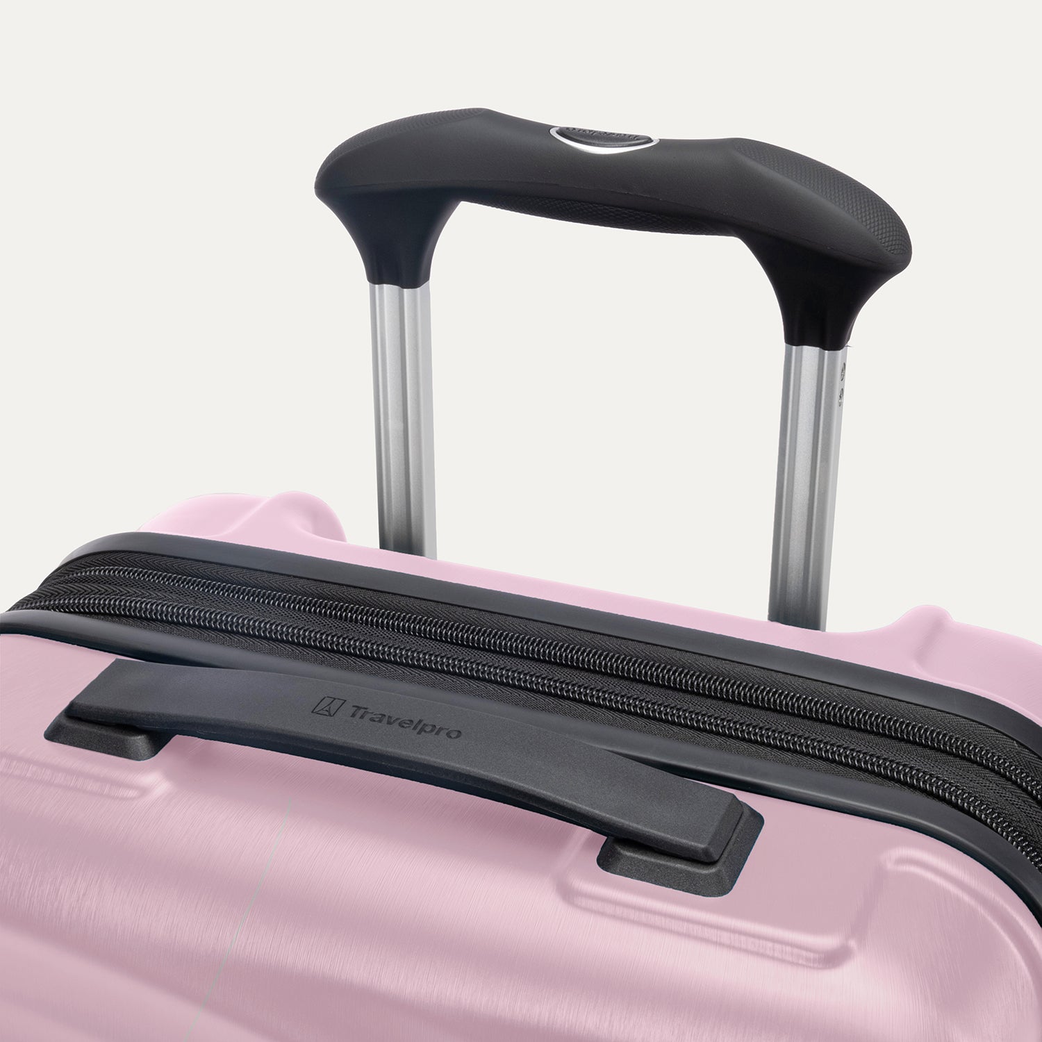Top view of Travelpro Maxlite Air V2 Carry-On Spinner in Orchid Pink, showing Contour Grip and PowerScope Lite Handle.