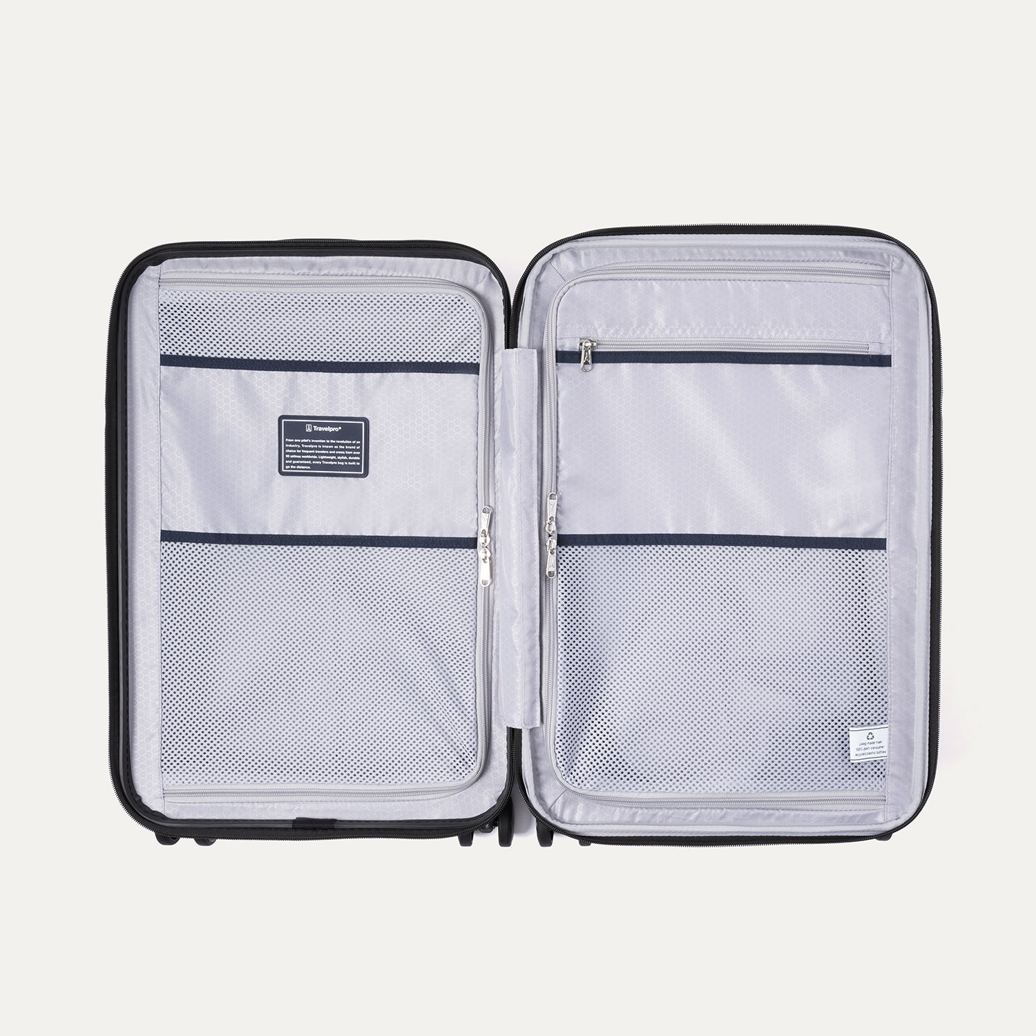 Interior view of Travelpro Maxlite Air V2 Spinner, featuring mesh zippered compartments for organized packing.
