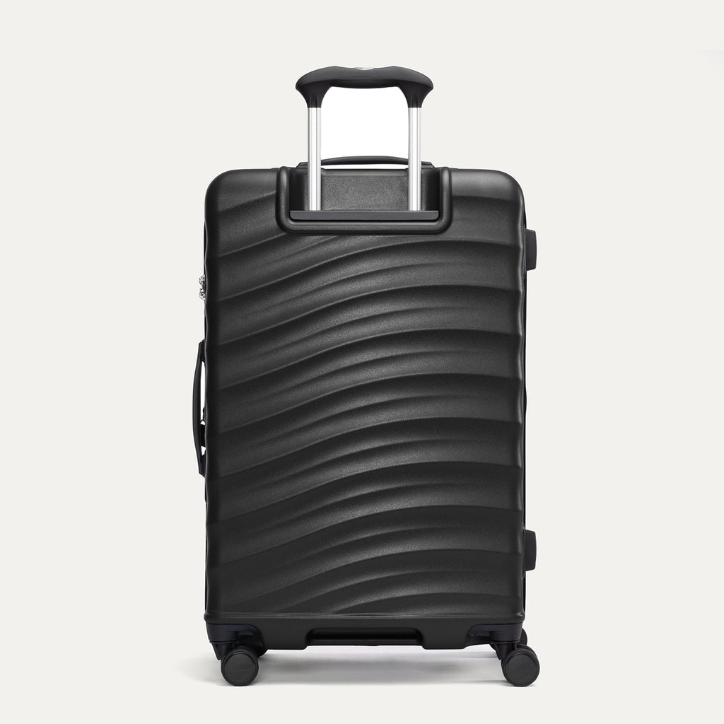 Rear view of Travelpro Maxlite Air V2 Check-In Spinner in Black, featuring an extended telescopic handle and side carry handle.