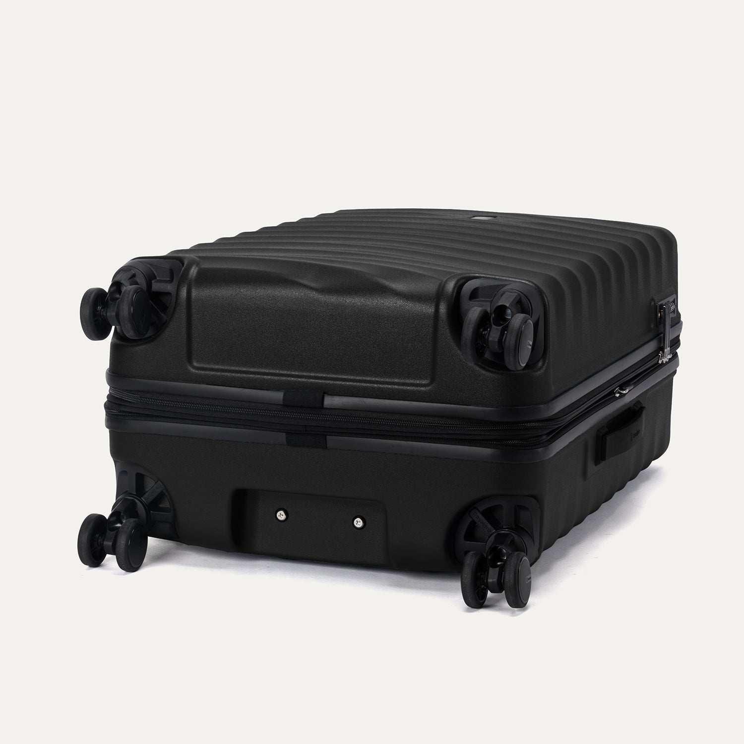 Bottom view of Travelpro Maxlite Air V2 Spinner in Black, featuring dual spinner wheels and visible side carry handle.