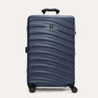 Front view of Travelpro Maxlite Air V2 Check-In Spinner in Midnight Blue, highlighting an telescopic handle and smooth-rolling spinner wheels.