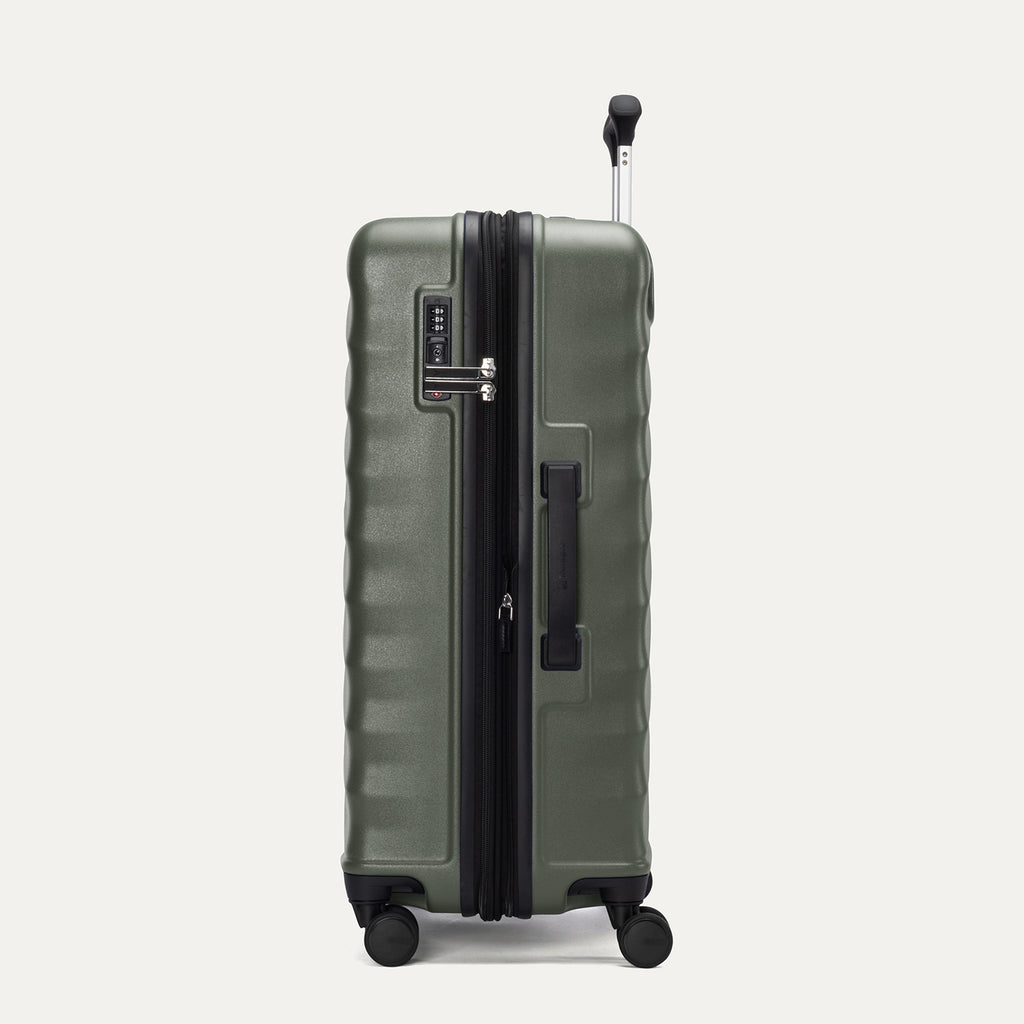 Side view of Travelpro Maxlite Air V2 Carry-On Spinner in Slate Green, showing expandable zipper and Low-Profile Side Carry Handles.
