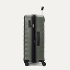 Side view of Travelpro Maxlite Air V2 Carry-On Spinner in Slate Green, showing expandable zipper and Low-Profile Side Carry Handles.