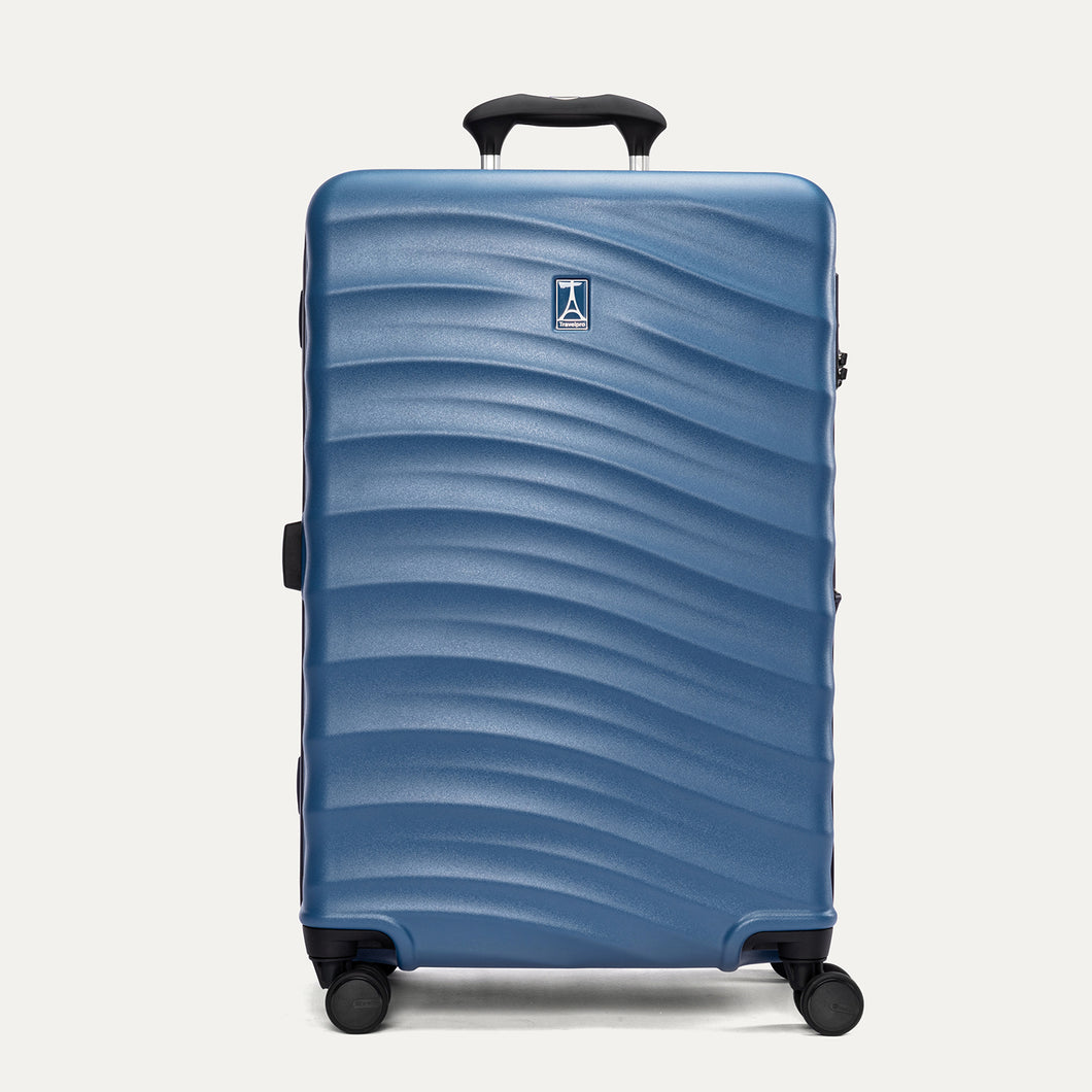 Front view of Travelpro Maxlite Air V2 Check-In Spinner in Ensign Blue, featuring a textured shell, integrated logo, top handle, and 360° spinner wheels.