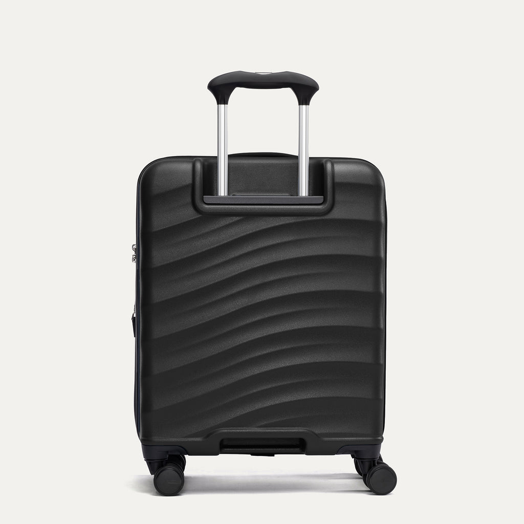 Rear view of Travelpro Maxlite Air V2 Compact Carry-On Spinner in Black, featuring the extended telescopic handle and smooth-rolling spinner wheels.