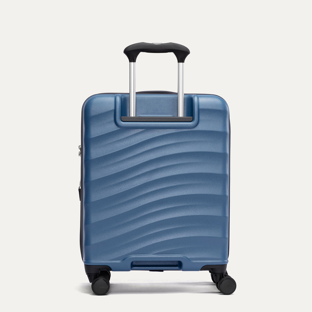 Rear view of Travelpro Maxlite Air V2 Compact Carry-On Spinner in Ensign Blue, featuring the extended telescopic handle and smooth-rolling spinner wheels.

