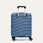Rear view of Travelpro Maxlite Air V2 Compact Carry-On Spinner in Ensign Blue, featuring the extended telescopic handle and smooth-rolling spinner wheels.

