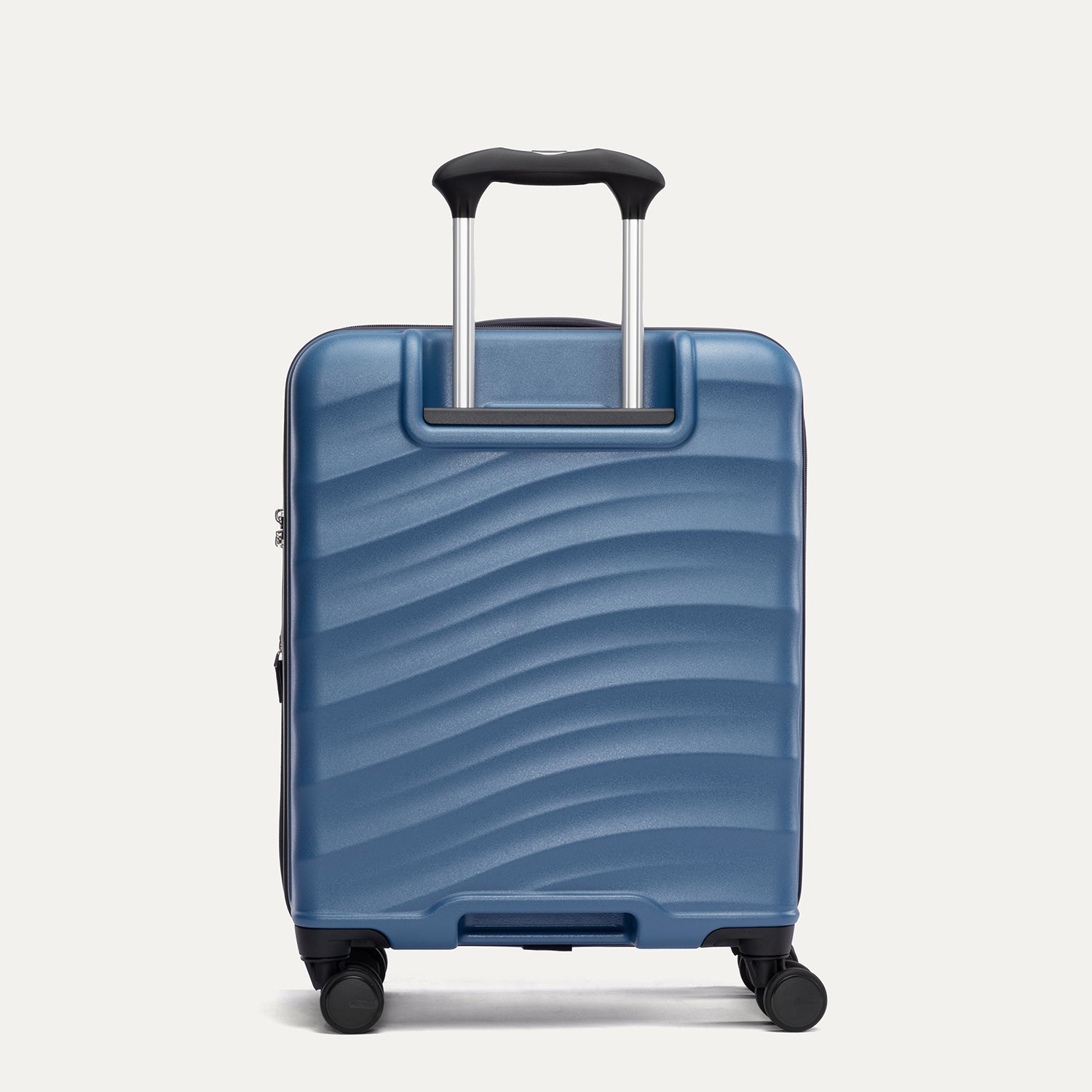 Rear view of Travelpro Maxlite Air V2 Compact Carry-On Spinner in Ensign Blue, featuring the extended telescopic handle and smooth-rolling spinner wheels.

