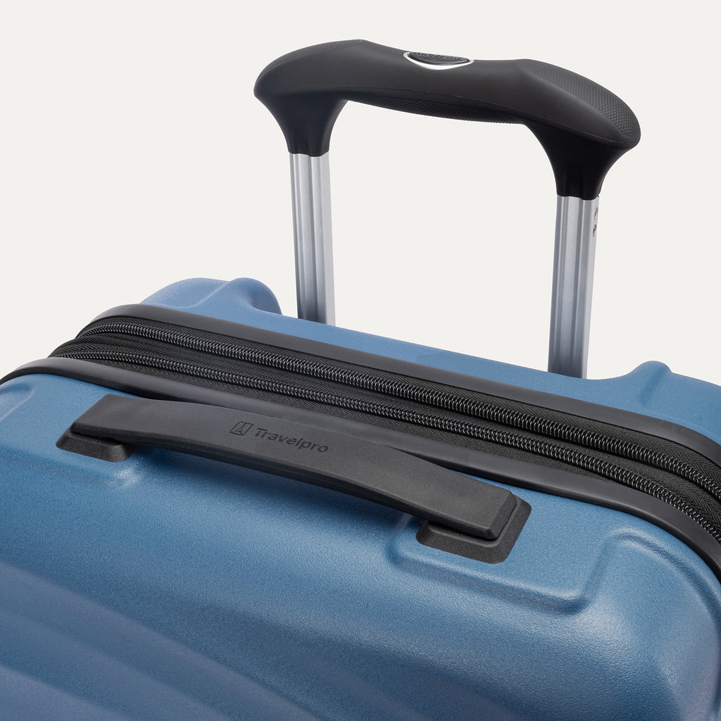 Top view of Travelpro Maxlite Air V2 Carry-On Spinner in Ensign Blue, showing Contour Grip and PowerScope Lite Handle.
