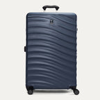 Front view of Travelpro Maxlite Air V2 Check-In Spinner in Midnight Blue, featuring a textured shell, top handle, and 360° spinner wheels. 