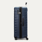 Side view of Travelpro Maxlite Air V2 Check-In Spinner in Midnight Blue, showing expandable zipper, Low-Profile Side Carry Handle, and extended PowerScope Lite Handle