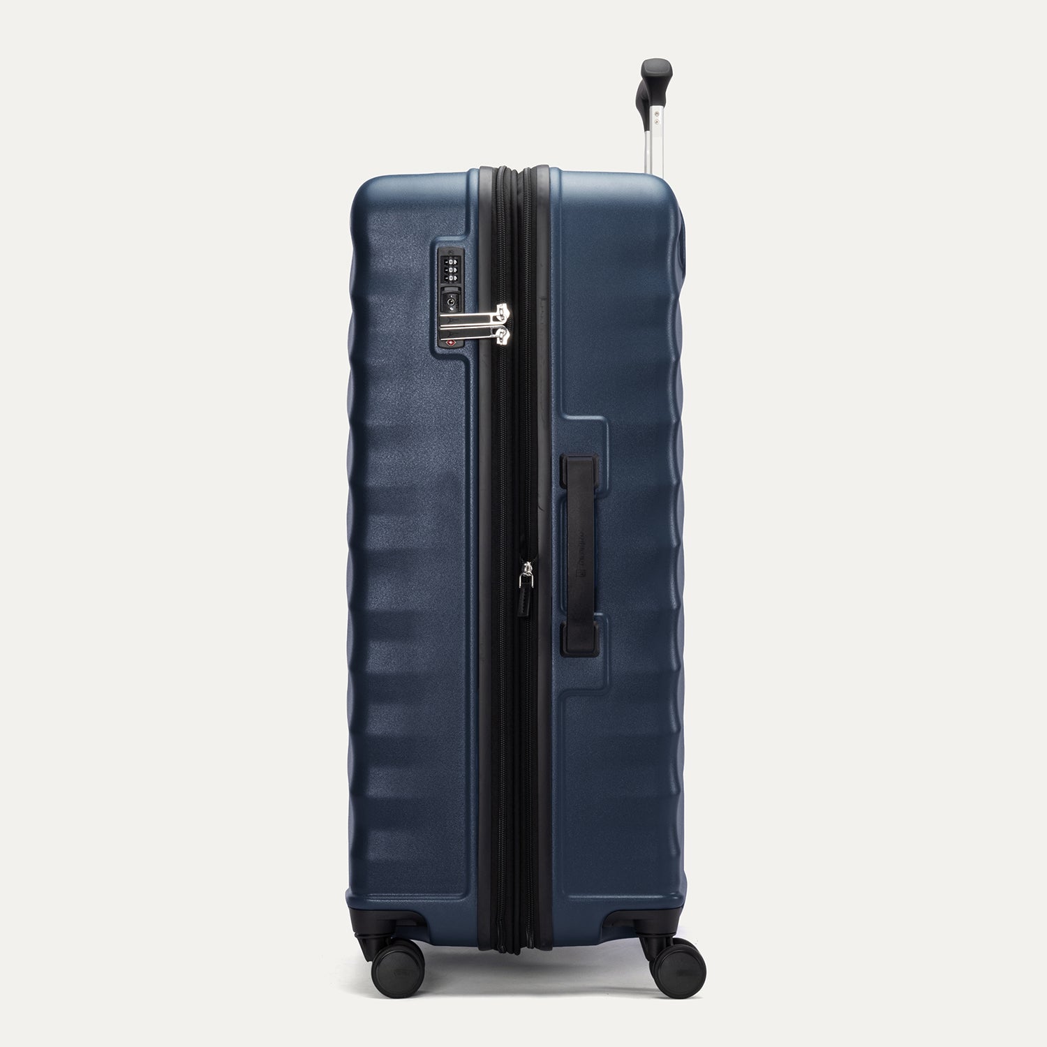 Side view of Travelpro Maxlite Air V2 Check-In Spinner in Midnight Blue, showing expandable zipper, Low-Profile Side Carry Handle, and extended PowerScope Lite Handle