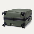 Bottom view of Travelpro Maxlite Air V2 Spinner in Slate Green, featuring dual spinner wheels and visible side carry handle.