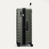 Side view of Travelpro Maxlite Air V2 Check-In Spinner in Slate Green, showing expandable zipper, Low-Profile Side Carry Handle, and extended PowerScope Lite Handle.