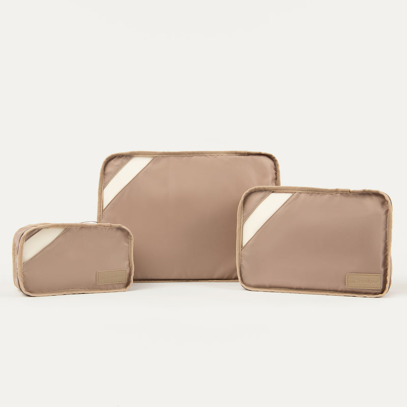 Front view of Travelpro Essentials 3 Pack Packing Cube Set (S/M/L) in KHAKI, with angled accent panels for easy ID.
