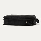 Rear expanded view of the Travelpro® Medium Packing Cube in black with a side handle and dual zipper closures.

