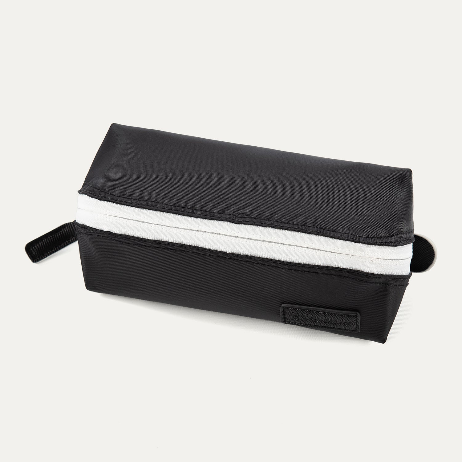 Travelpro MaxAccess Cubes™ Small Organizer in black with a white zipper.