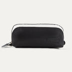A black Travelpro Essentials MaxAccess Cubes small organizer with a zipper, made from high-density polyester fabric, with a built-in side pocket for storing smaller items.