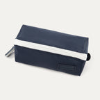 Small navy Travelpro MaxAccess Cubes organizer with white zipper and side loop, shown at an angled front view.
