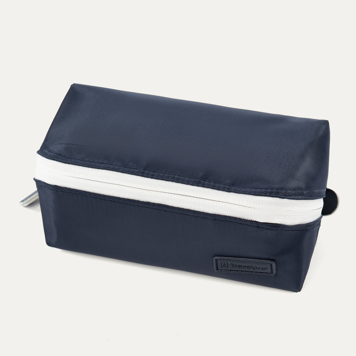 Front angled view of the Travelpro MaxAccess Cubes™ Large Organizer in navy with a contrasting white zipper and stitched Travelpro logo patch