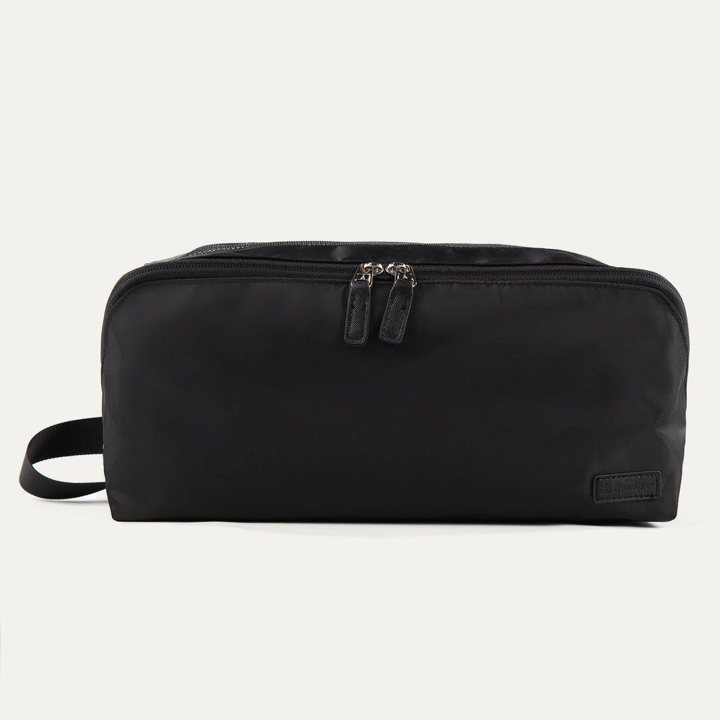 Front view of the Travelpro MaxAccess Cubes™ Large Shoe Organizer in black with dual zippers and a side handle.