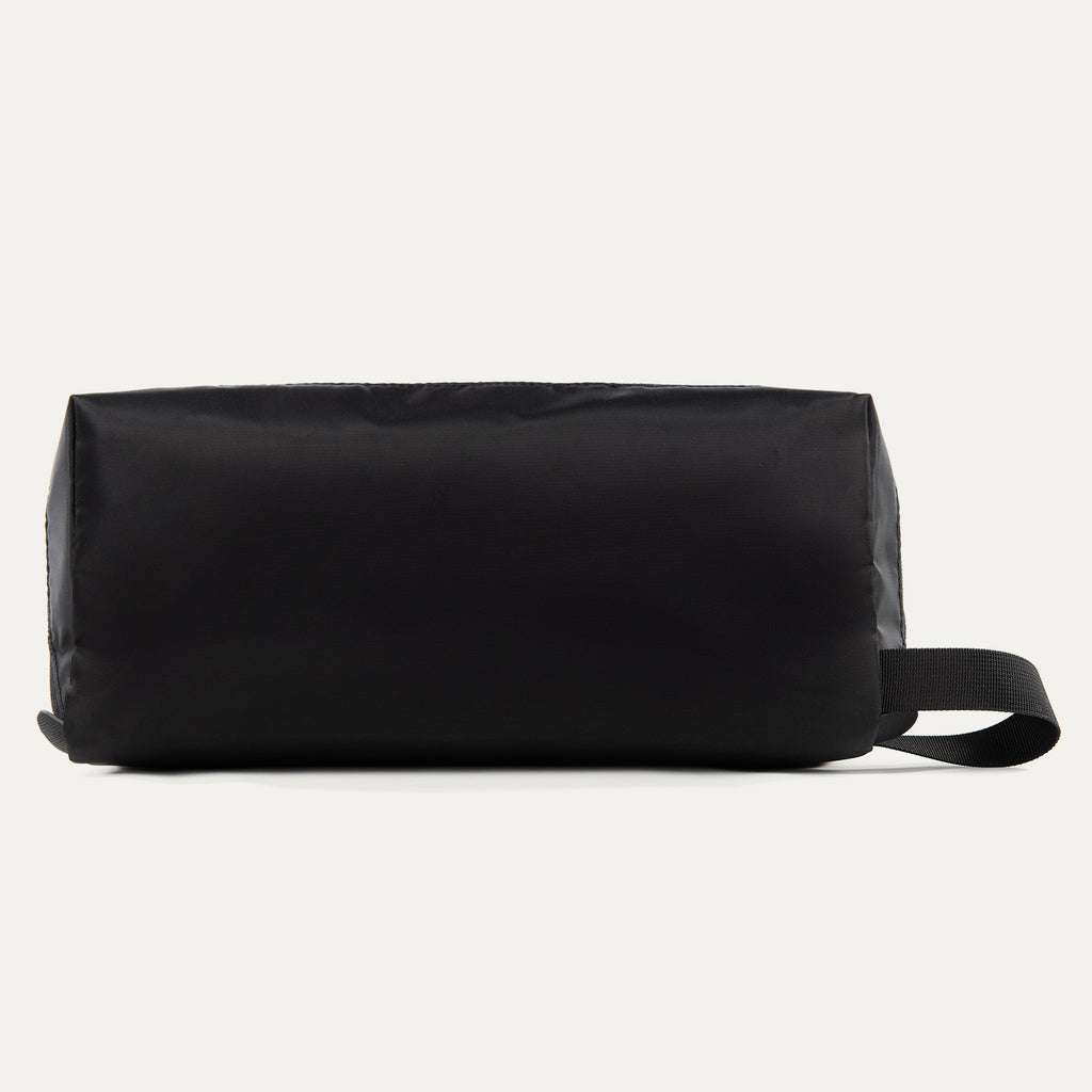 Rear view of the Travelpro MaxAccess Cubes™ Large Shoe Organizer in black with a side carry handle.