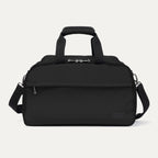 A black Travelpro 2-in-1 travel tote and cooler with a zippered front pocket, side handles, and a removable shoulder strap.