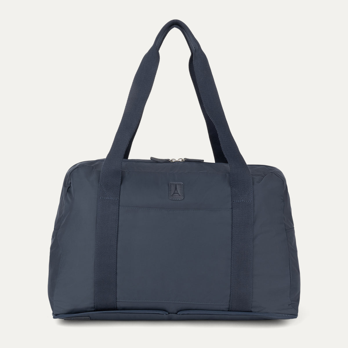 Front view of the Travelpro Essentials SparePack Foldable Duffel 2.0 in Navy, showcasing the lightweight, abrasion-resistant fabric, durable top carry handles, and the QuickSlip front pocket for convenient on-the-go storage.