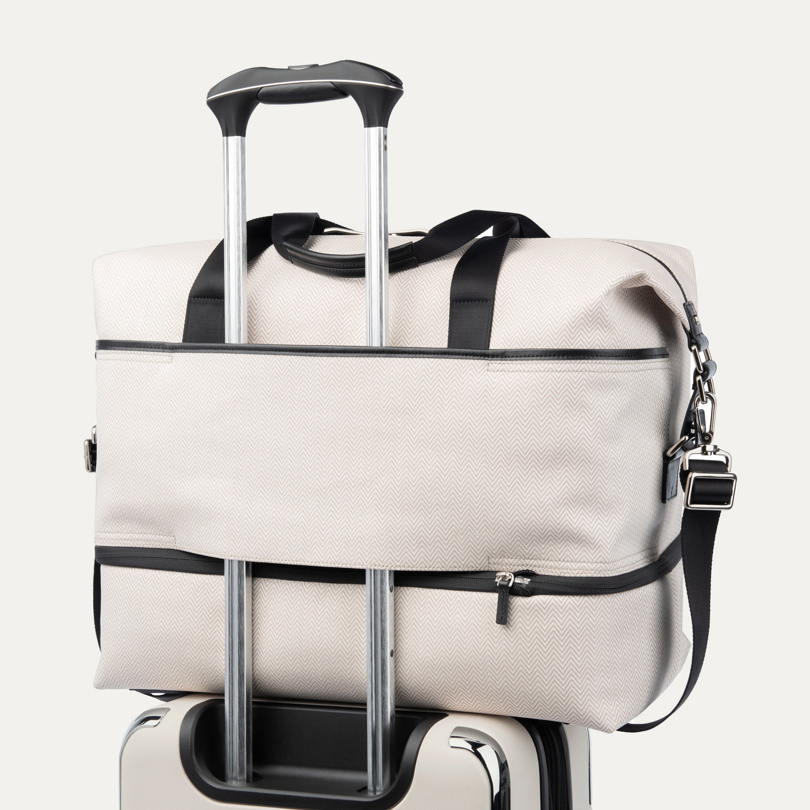 Travelpro® x Travel + Leisure® Medium Check-in Spinner and Drop-Bottom Weekender Bag Luggage Set