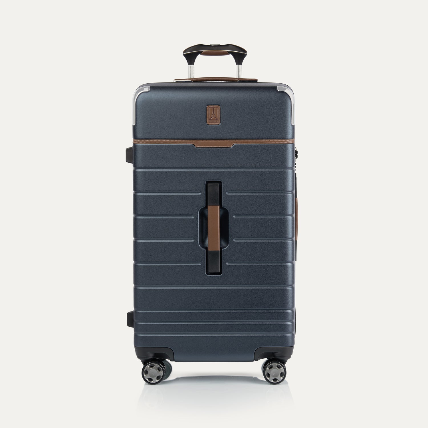 Front view of Travel + Leisure® Large Check-In Expandable Spinner in Monaco Blue, with textured hard shell, contrast brown trim, and dual spinner wheels.