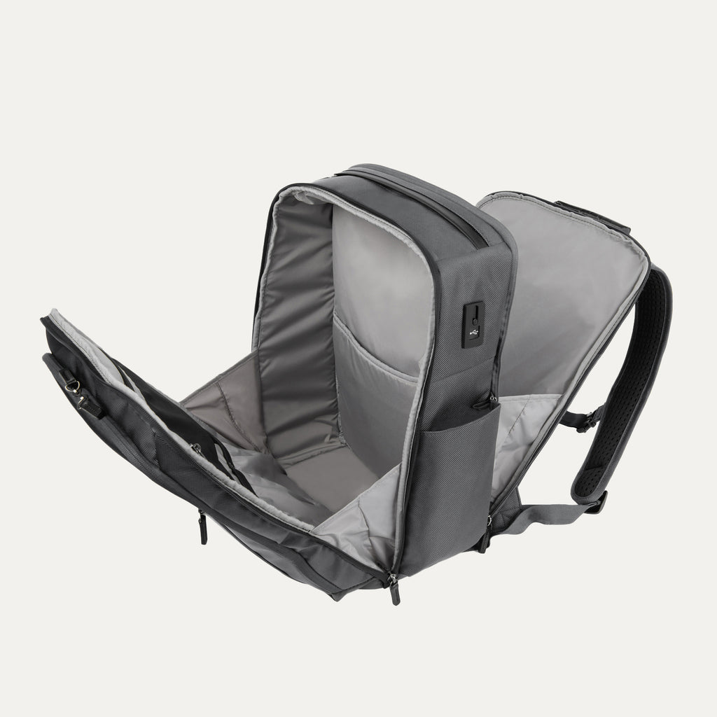 Open view of the Crew Executive Choice 3 Large Travel Backpack in Titanium Grey, showcasing the spacious main compartment and interior organizational pockets designed for efficient packing and accessibility.