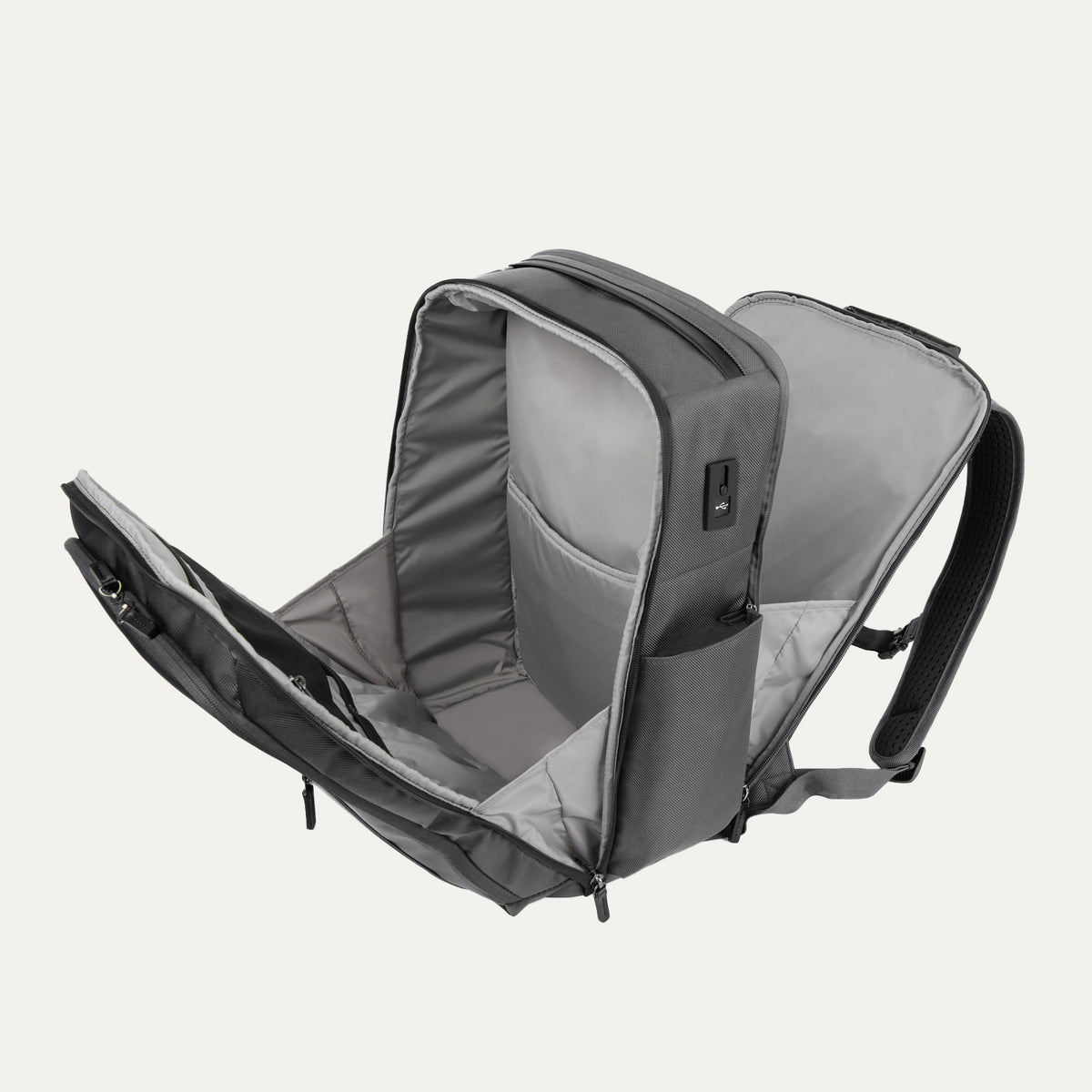 Open view of the Crew Executive Choice 3 Large Travel Backpack in Titanium Grey, showcasing the spacious main compartment and interior organizational pockets designed for efficient packing and accessibility.