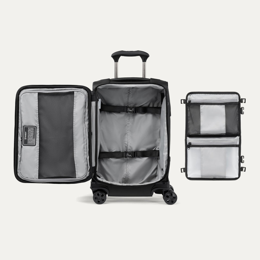 Interior of Travelpro Crew Classic Carry-On in Black, showing detachable panel with organizational pouches and adjustable straps.
